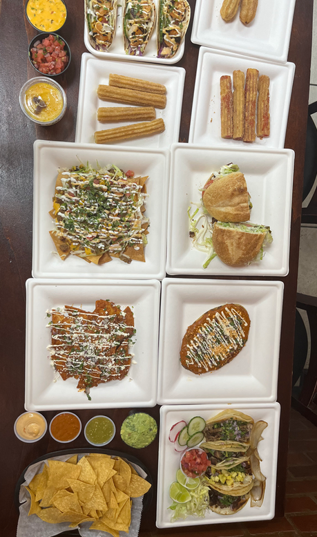A table of Taco Boys plates